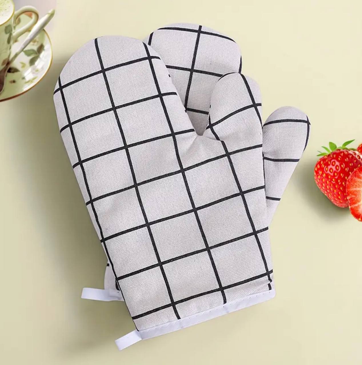 A pair of cotton oven gloves