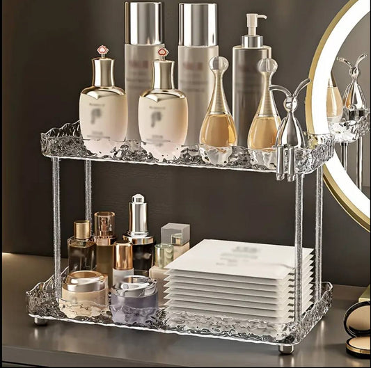 Two tier crystal-like makeup organizer.