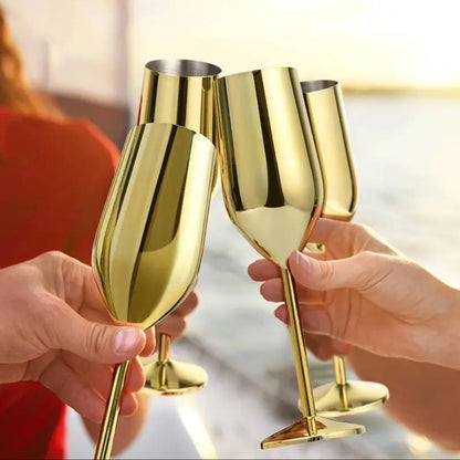 A pair of Gold Stainless steel wine glass