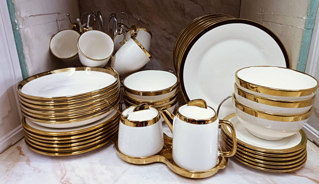 40pc Gold Ring Ceramic Dinner Set.