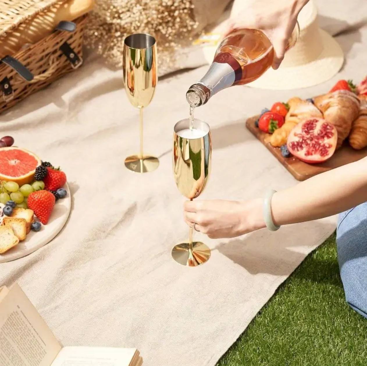 A pair of Gold Stainless steel wine glass